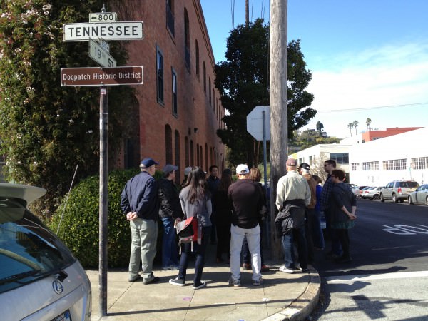 The walking tour stops outside an old distillery and wine warehouse, built in 1900, that now houses live/work lofts.